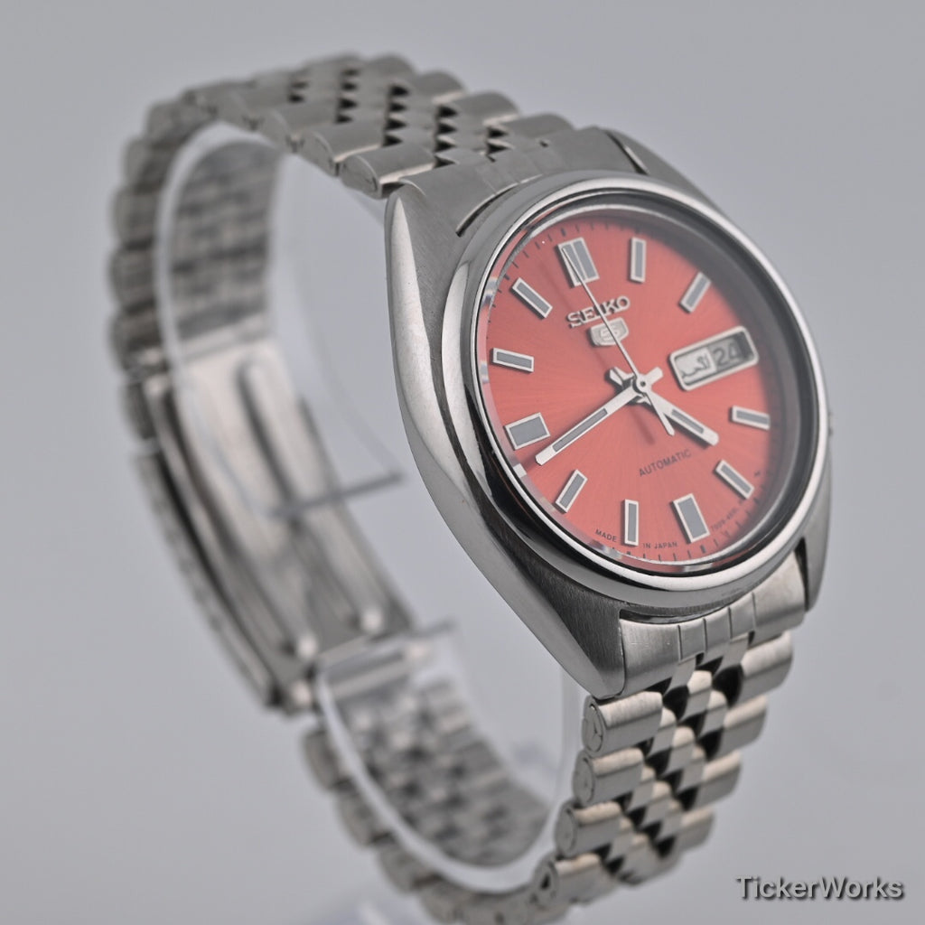Seiko 5 7009 burnt orange — case side
