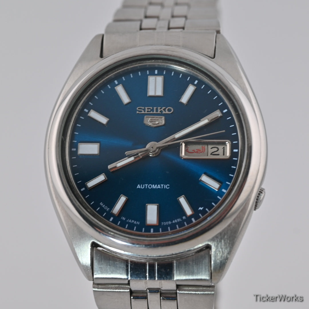 Seiko 5 Automatic 7009 Aqua Marine Arabic Dial 1980s Vintage Watch