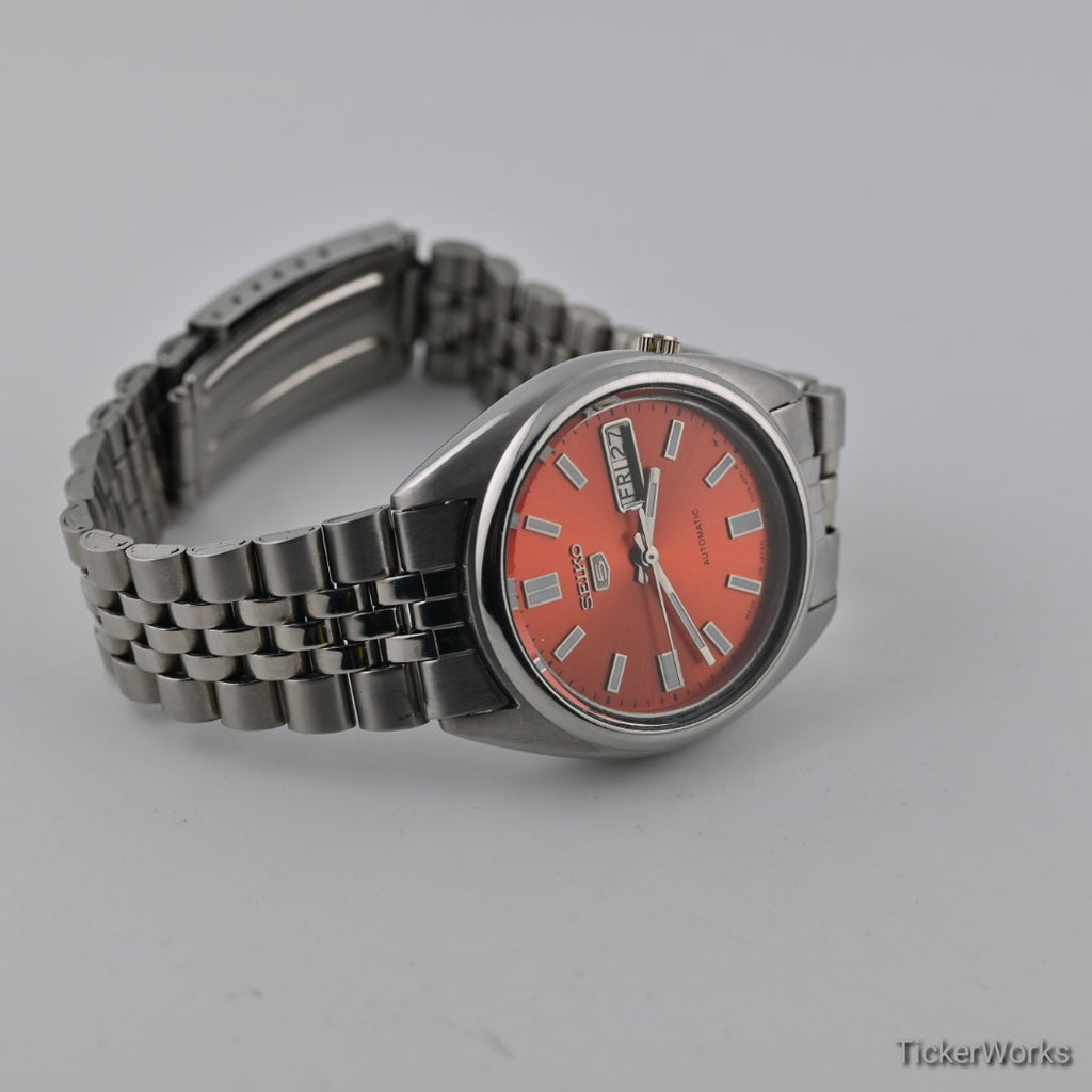 Seiko 5 7009 burnt orange Arabic dial — hero
